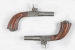 Paire de pistolets "coup de poing" milieu XIXe siècle, mécanismes...