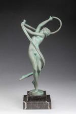 Max LE VERRIER (1891-1973). " Tourbillon ". Statuette d'une femme...