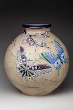 AMPHORA. Vase boule en céramique polychrome à décor de papillons...