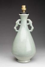 Pol CHAMBOST (1906-1983). Pied de lampe en céramique vert céladon...