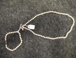 PARURE comprenant un collier et un bracelet de perles de...