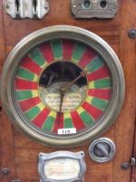 "Sélect.  Roulette", machine à sous en bois à cadran...
