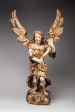 SCULPTURE en bois doré et polychrome à décor d'un ange...