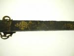 Couteau de chasse XVIIIe siècle. Lame à décor gravé et...