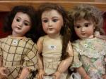 Lot de trois  poupées tête biscuit vendues en l'état....