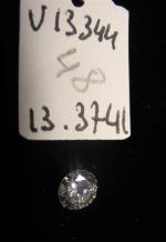 Diamant non monté taille brillant pesant 0,59 ct.