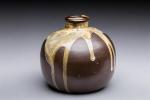 Jean POINTU (1843-1925). Vase de forme boule en grès marron...
