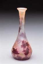 LEGRAS. Vase soliflore en verre gravé à l'acide et émaillé...